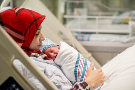 Woman holding her newborn